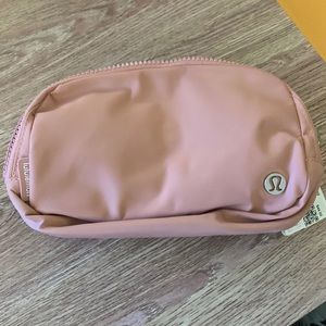 BNWT lululemon belt bag in pink pastel